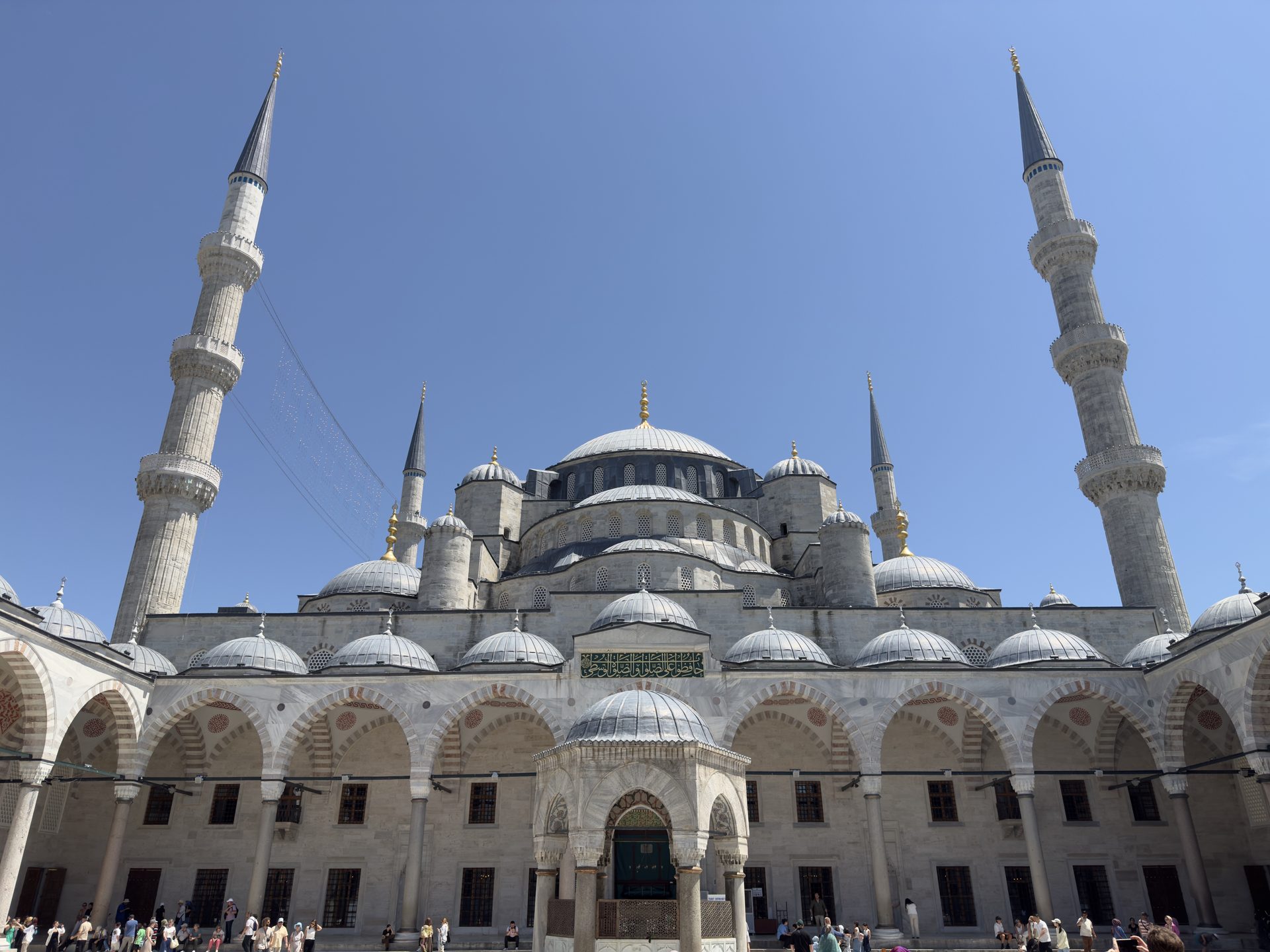 The Blue Mosque's cascading domes and minarets seen from its courtyard, Istanbul