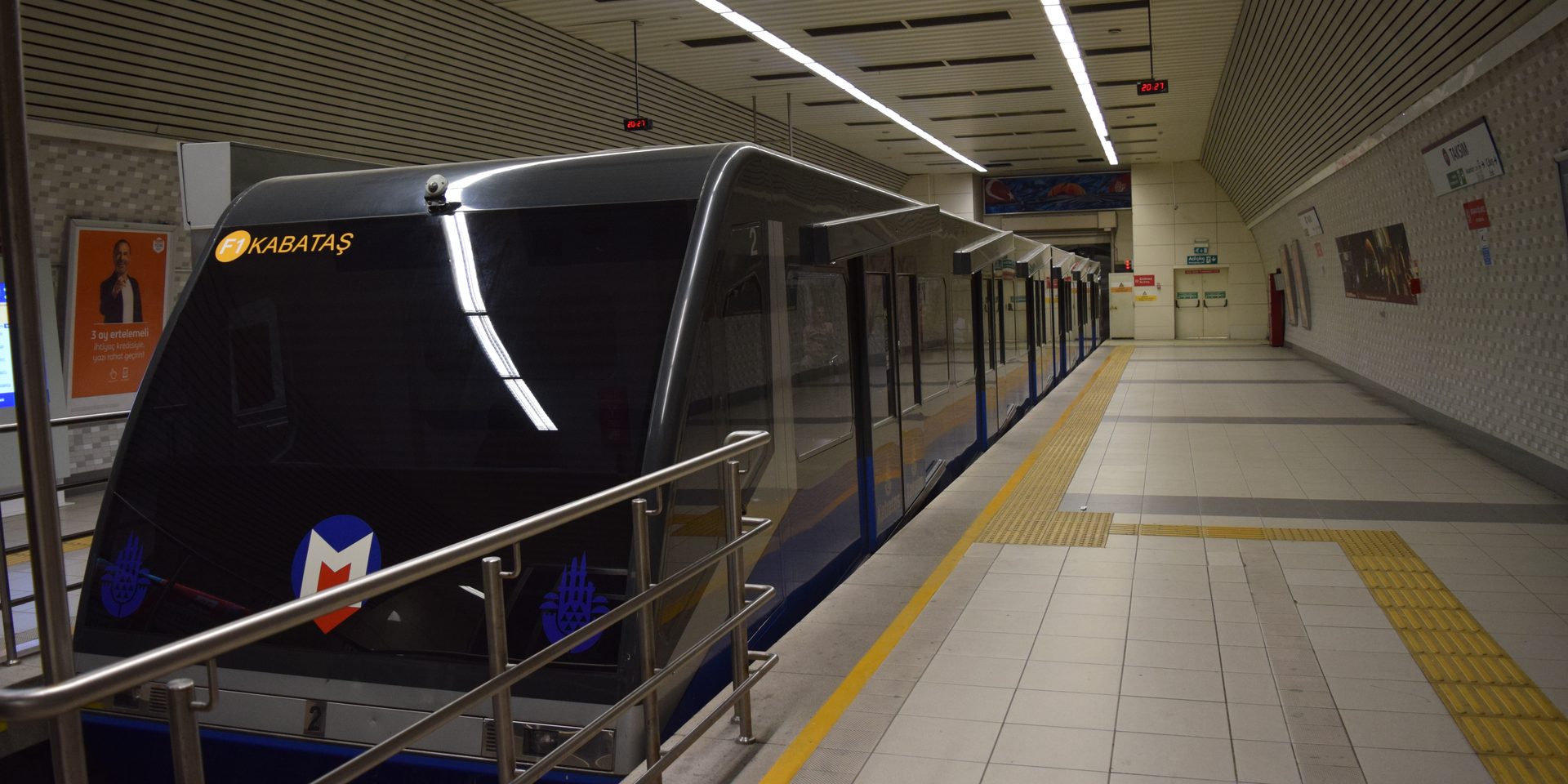 F1 Kabataş–Taksim funicular car waiting at the platform of Taksim station, its destination sign reading F1 Kabataş