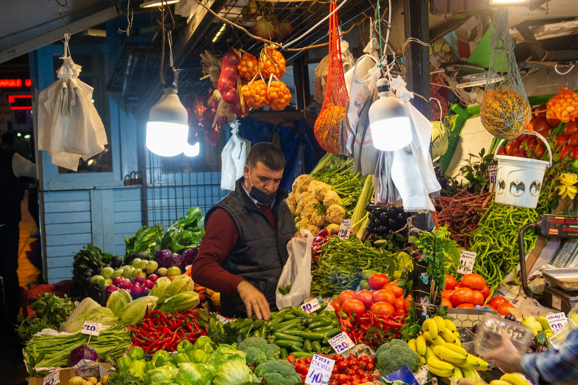 Greengrocer stall piled with vegetables at the Kadikoy market in Istanbul
