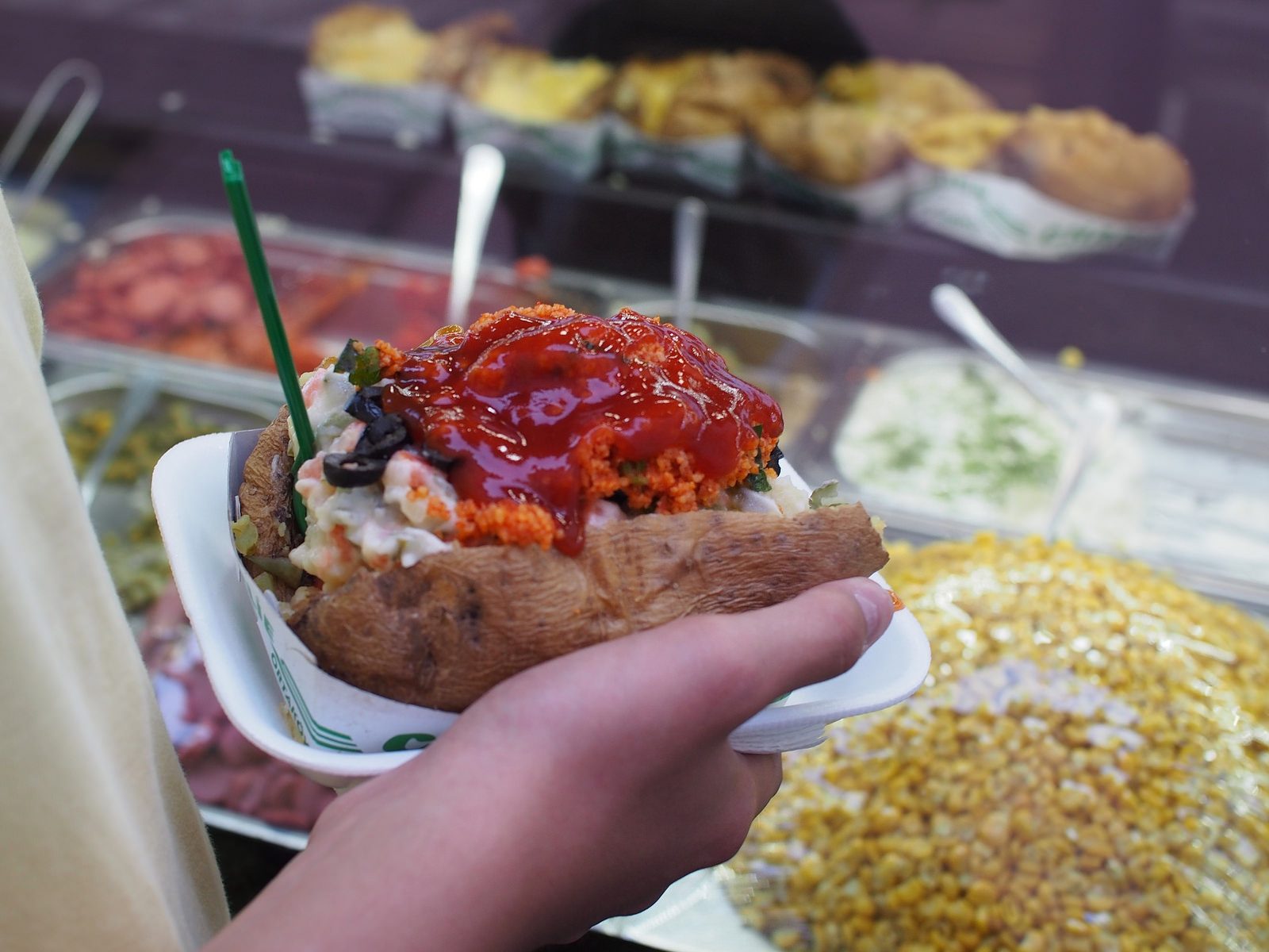 Eating kumpir in Ortaköy, Istanbul.