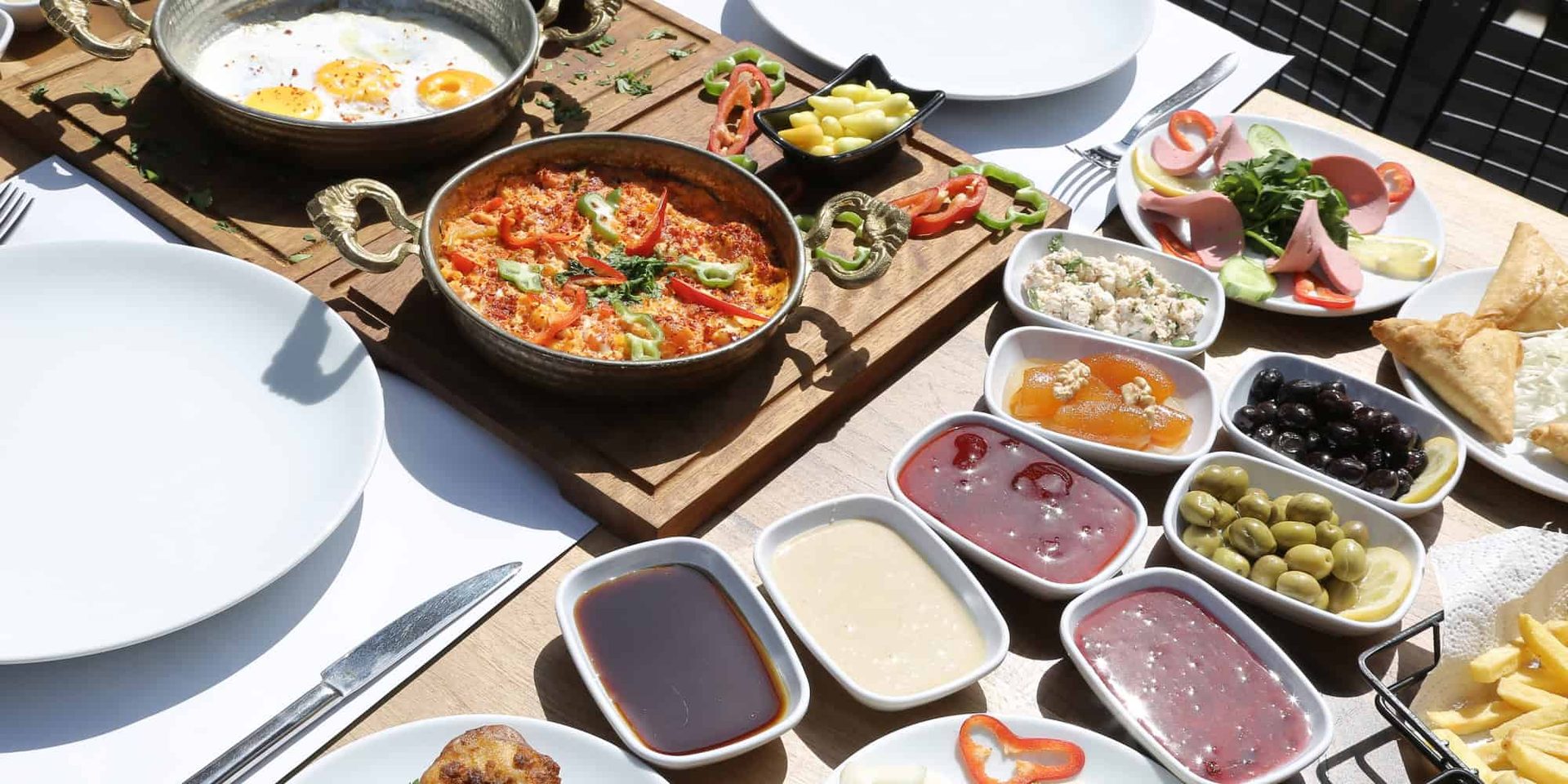 Typical Turkish breakfast with menemen.